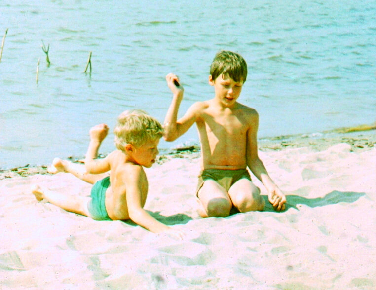 Нужно камешком сбить палочку.