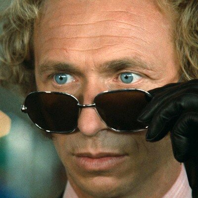 Фото из фильма "Возвращение высокого блондина" (1974)
