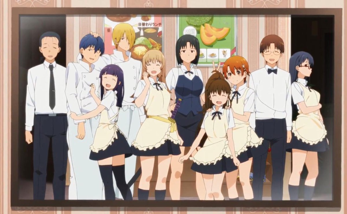 Коллектив ресторана "Wagnaria". И да, у девушки по центру катана.