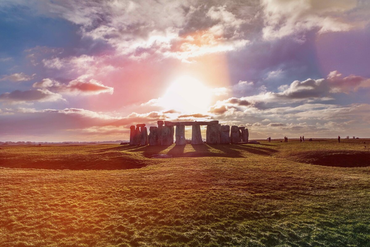 © Thomas Lukassek. Stonehenge against the sun, Wiltshire, England