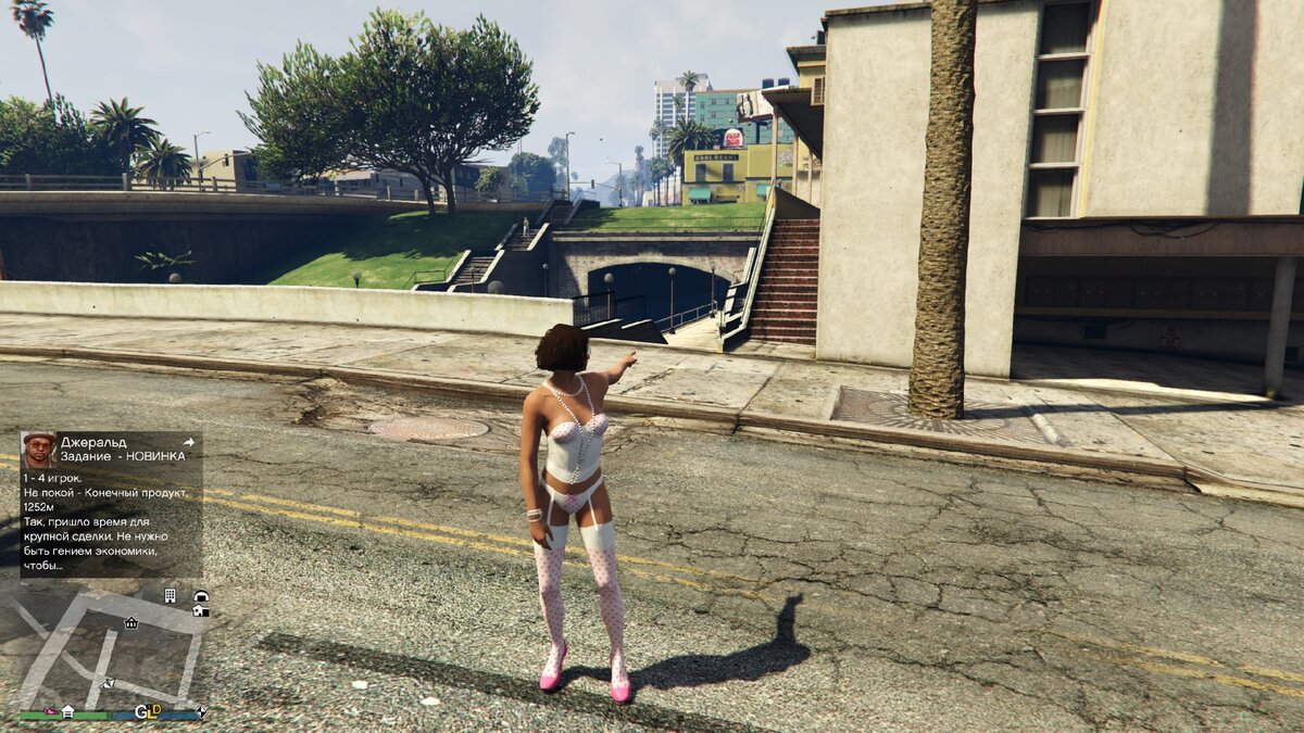 Фигурка Mini Pogo находится на деревянном спуске к водяному каналу в городе / Mini Pogo figurine is located on a wooden descent to the water channel in the city