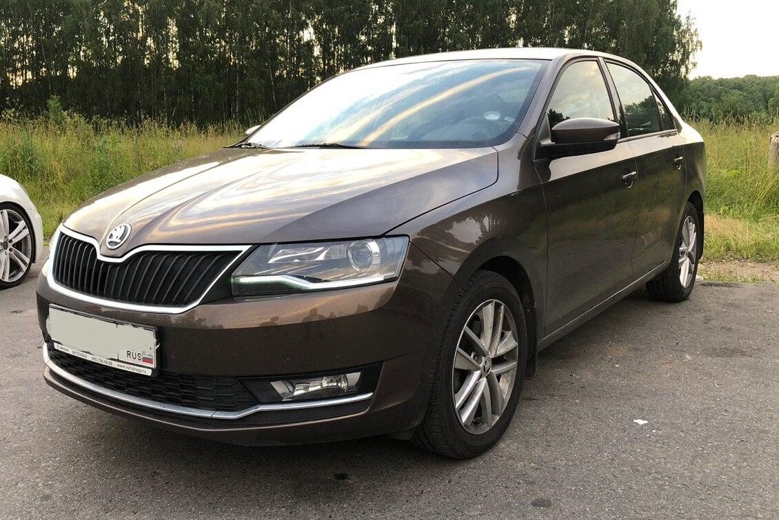 Skoda Rapid 2019 1.6 AT Style(зимний пакет+оптика), вид спереди+ с левой стороны