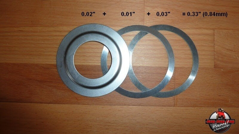 Вот такой комплект должен быть под внутренней обоймой подшипника хвостовика.