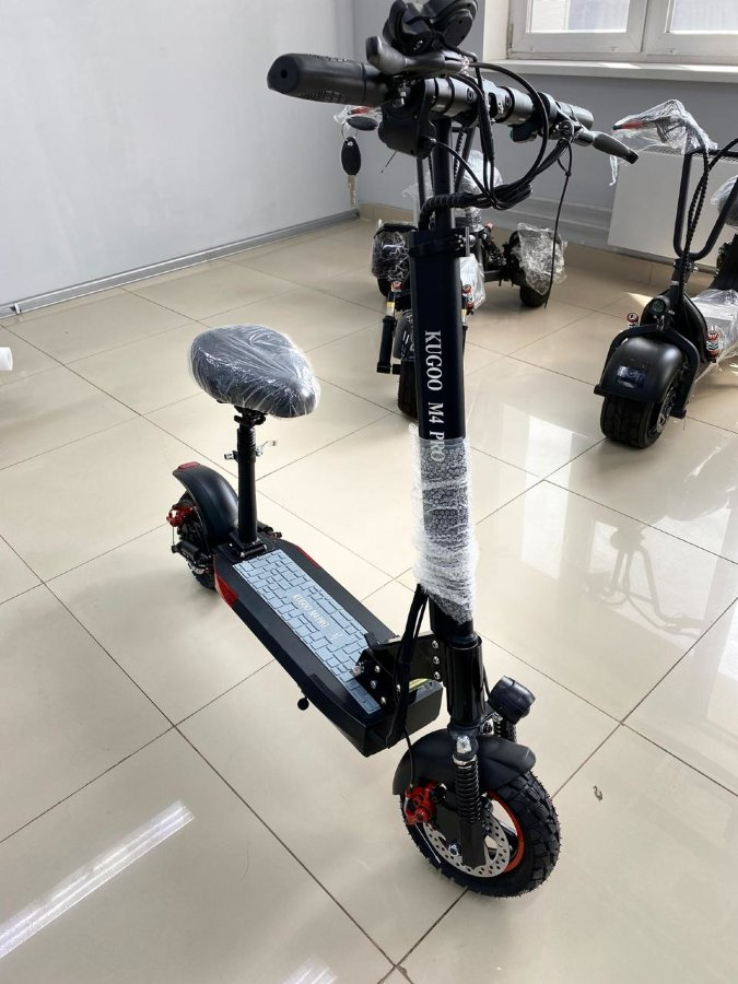 Koogo m4. Электросамокат Kugoo м4 Pro. Электросамокат Kuga m4 Pro. Электросамокат Kugoo m 4 Pro Pro 2022. Электросамокат Kugoo m4 Pro 13.5 Ah 48v 2021.