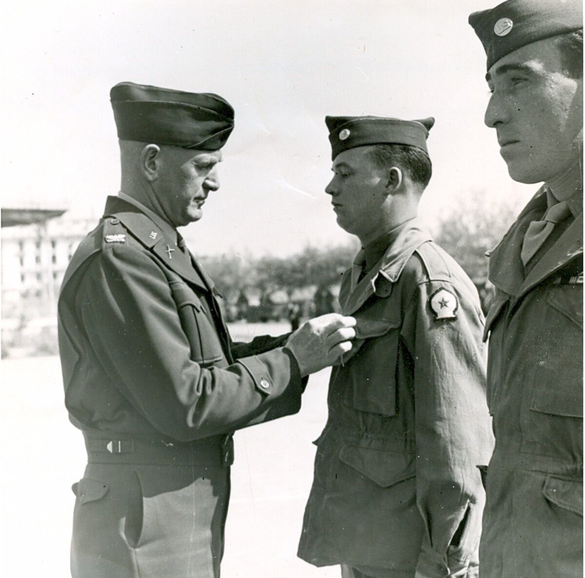 Frank Henderson gets a medal