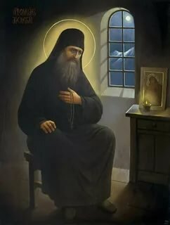 Прп. Силуан благодарит Божию Матерь. Икона из открытого доступа. 