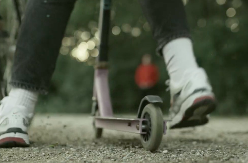 Девочки на самокатах едут домой- реконструкция