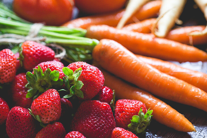 Royalty-Free photo: Preparing Fresh Breakfast: Strawberries & Carrots | PickPik