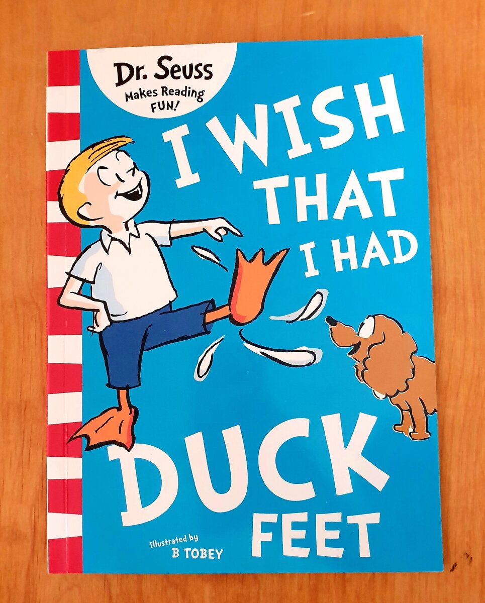 Фото автора. На изображении книга "I wish that I had duck feet". Текст Dr. Suess.