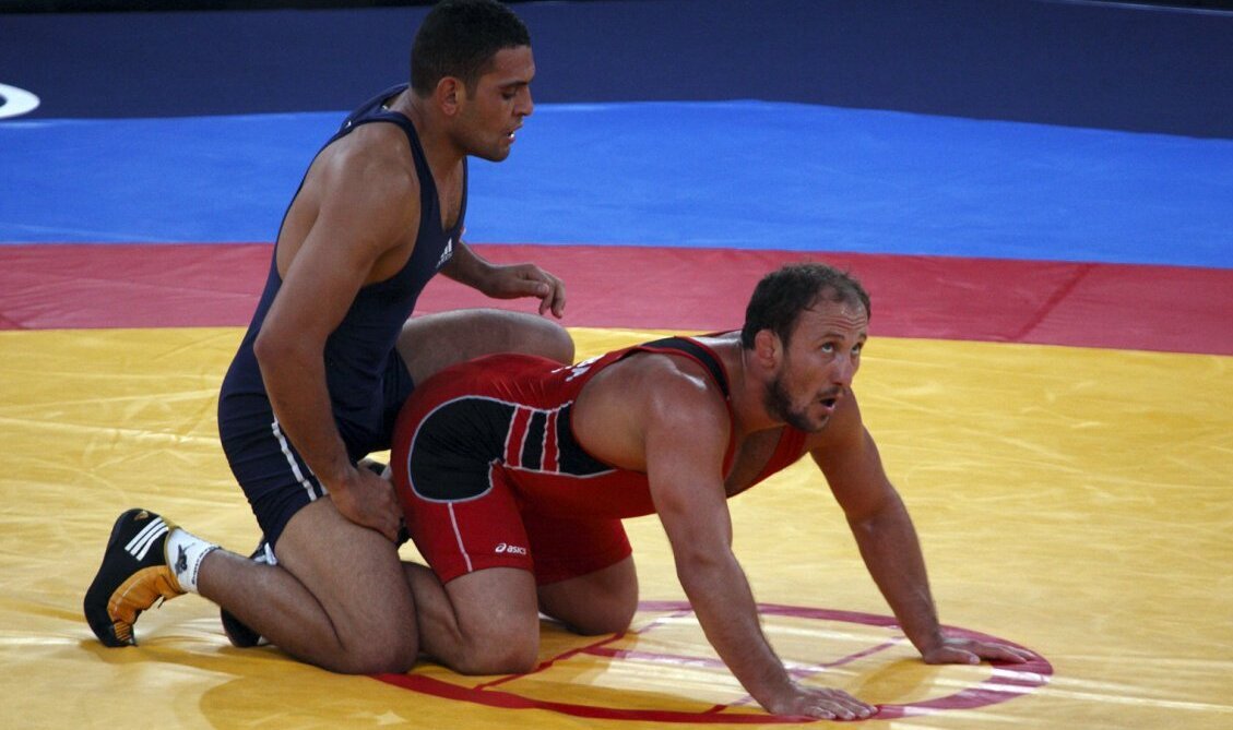 Wrestling перевод. Вольная борьба партер. Греко Римская борьба партер. Партер в греко-римской борьбе. Борцы в партере.