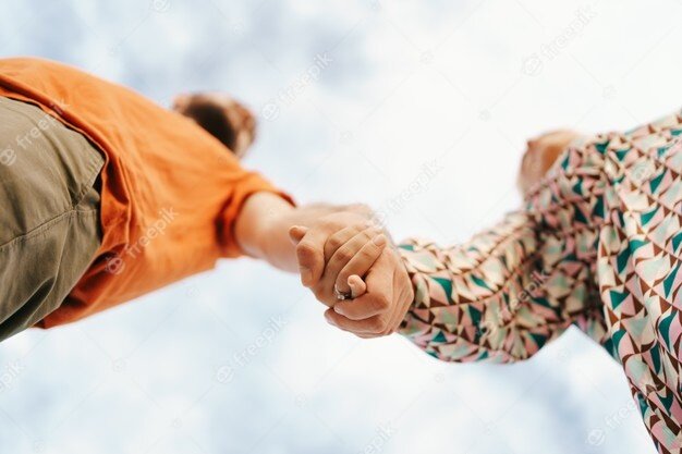 https://image.freepik.com/free-photo/happy-young-couple-in-colorful-clothes-with-sky_158595-6591.jpg