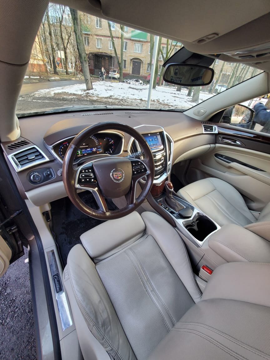 Осмотр перед покупкой Cadillac SRX за 1 500 000 р. 