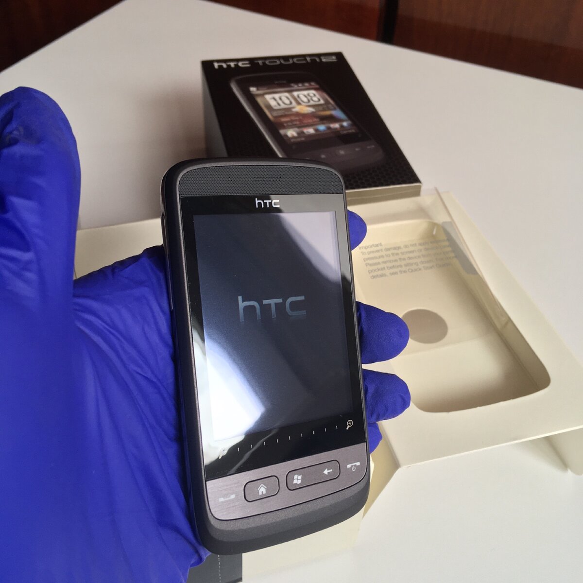 Распаковка нетронутого телефона htc touch2, спустя 12 лет!