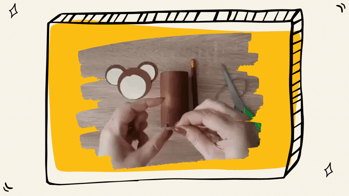 Далее в пробитые дырки вставьте нитки с бусинами на концах. Так как показано на видео.