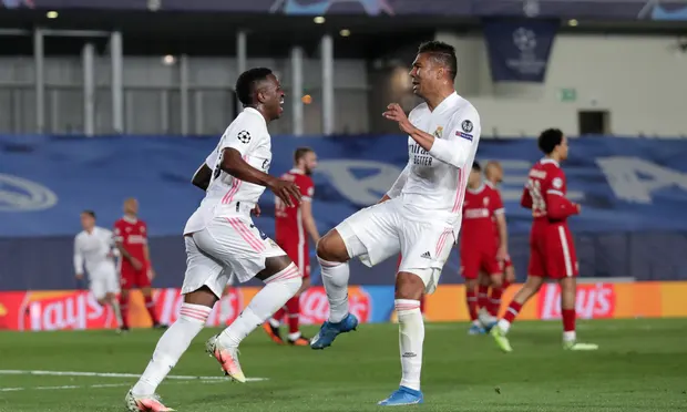 Vinícius Júnior celebrates with Casemiro after scoring his second goal of the game. Photograph: Gonzalo Arroyo Moreno/Getty Images