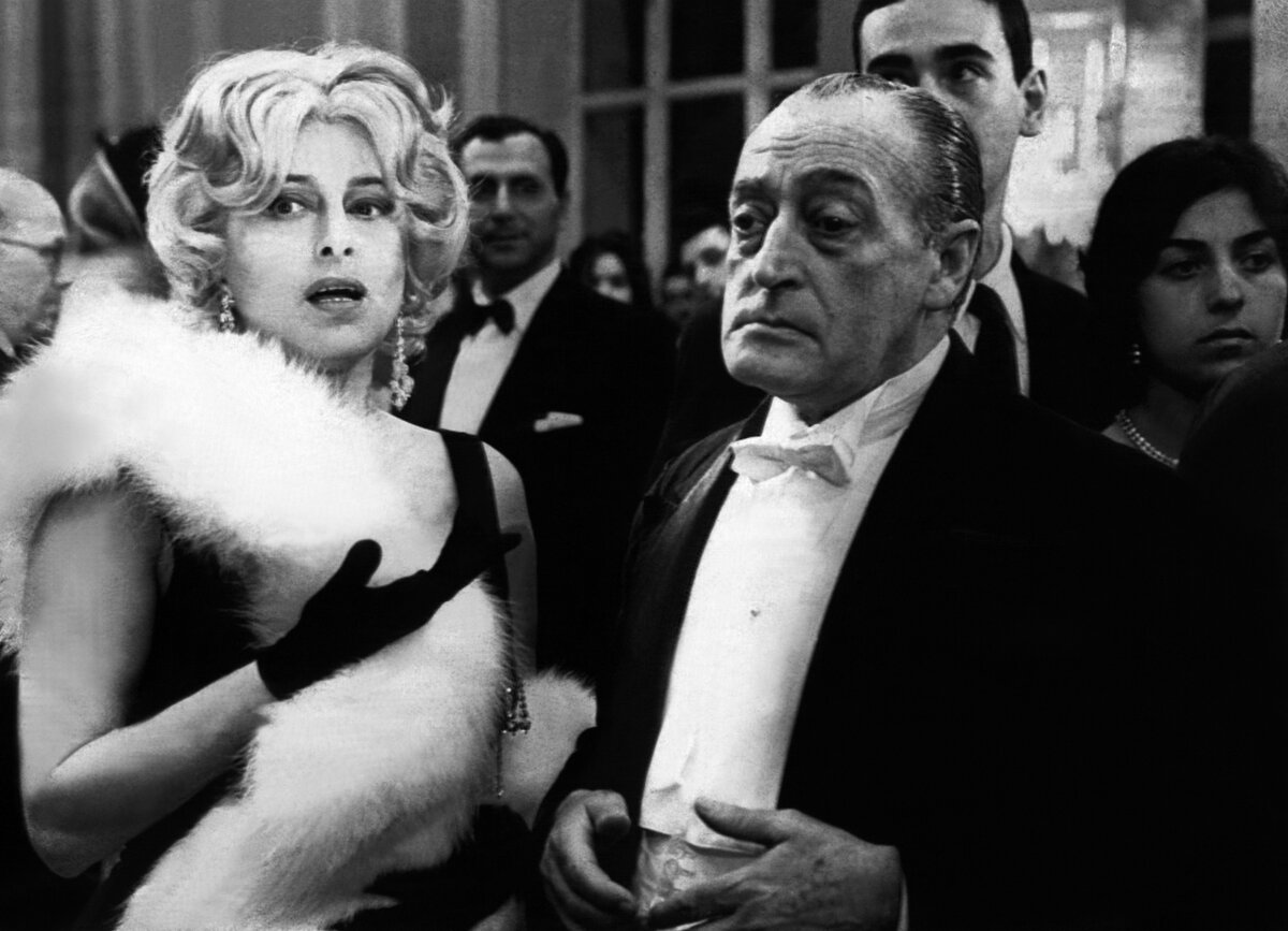 Кадр из фильма. Анна Маньяни и Тото в главных ролях. (Источник: Яндекс картинки)