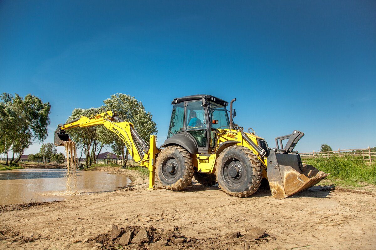 New holland b80b. Нью Холланд b115. New Holland b115b. Экскаватор-погрузчик New Holland b115-4pt.