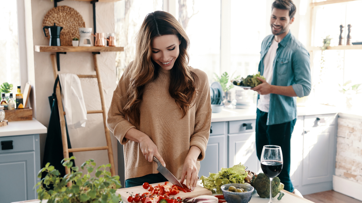 I began cooking dinner instead of going. Preparing dinner on the kitchen. cooking love stories. cooking with love.