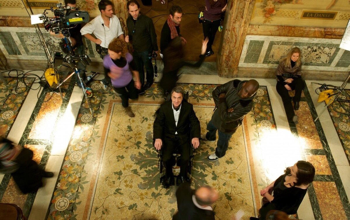 Франсуа Клюзе и Омар Си на съёмках фильма Intouchables. Фотография с сайта Kinopoisk.ru