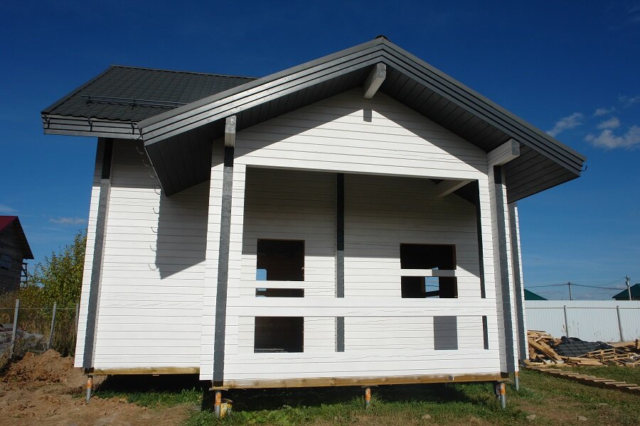 Обработка и покраска дома из бруса