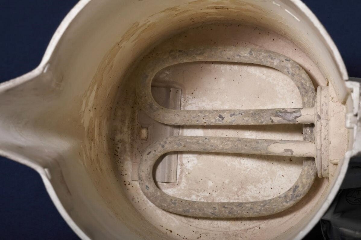 Накипь после кипячения воды