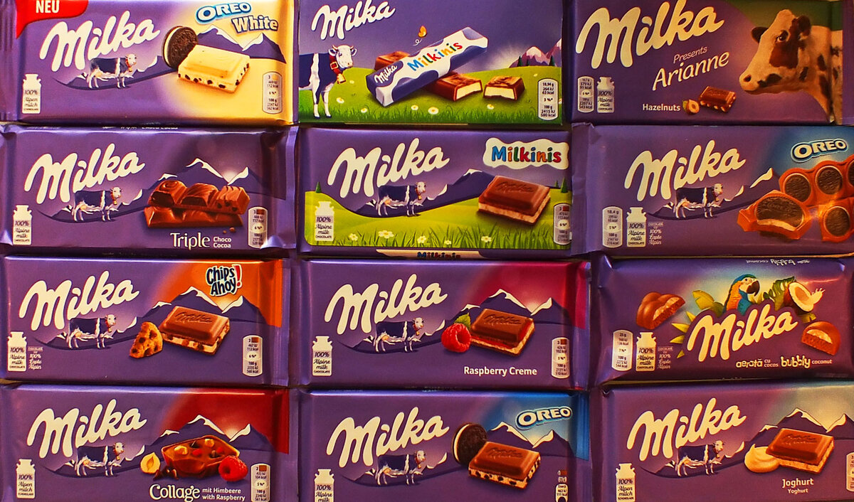 Сколько долек в милке. Шоколад Милка. Мтлаа шоколад. Шоколад "Milka". Ассортимент шоколада.