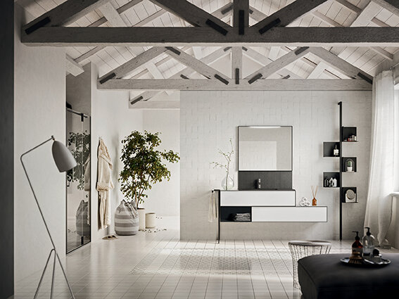 Как насчет того, чтобы отвести для ванной комнаты половину мансардного этажа? Идея выглядит симпатичной с учетом, что вторую половину занимает спальня. На фото мебель для ванной от Artesi.