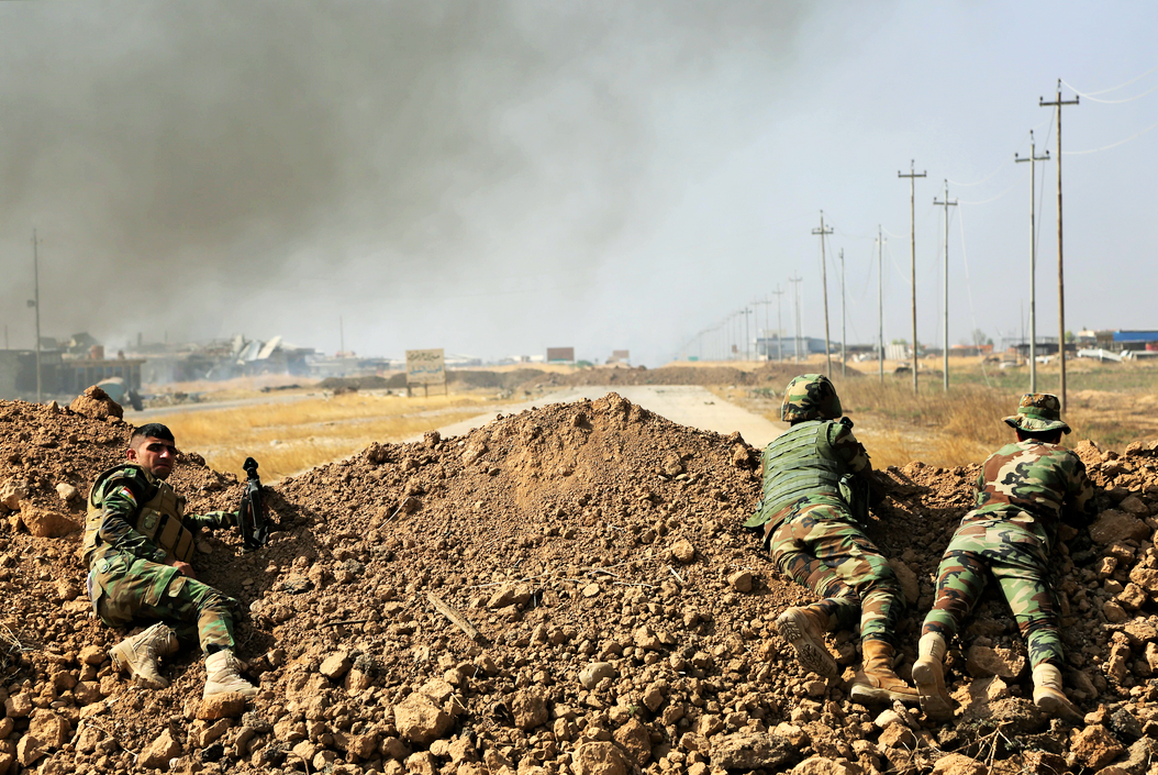 Иракские военные в районе Джурф ан-Наср, лето 2014 года. До Багдада осталось всего 50 километров. Фото IRNA.