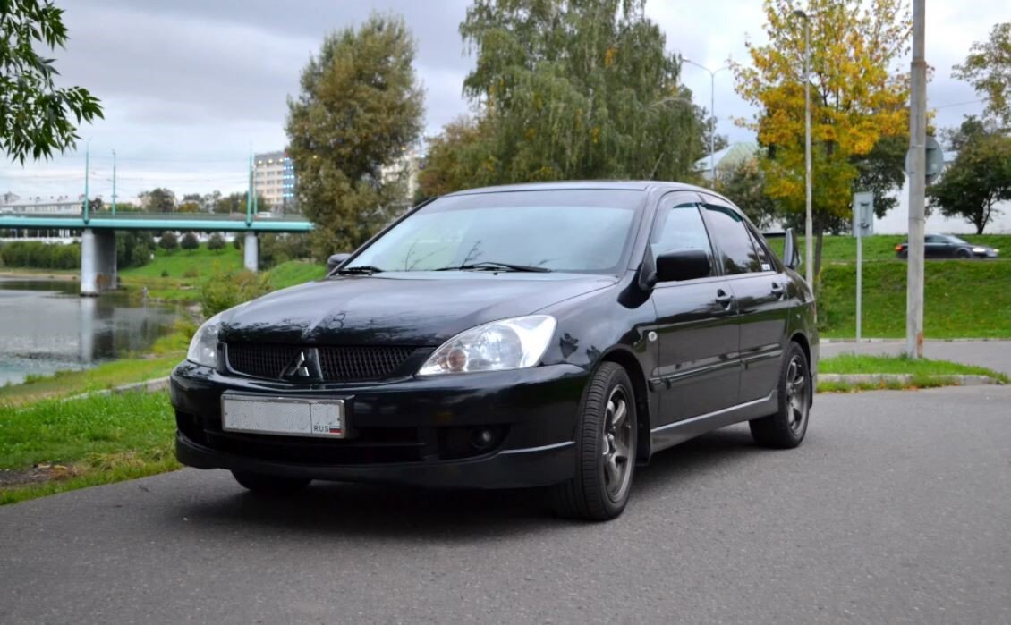 Митсубиси 9 фото. Mitsubishi Lancer 9. Mitsubishi Lancer 1.6 2006. Лансер 9 1.6 2006. Митсубиси Лансер 9 2006 черный.