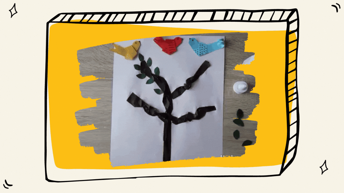 Размещаем птичек на ветках. Вырезаем листочки и наклеиваем.