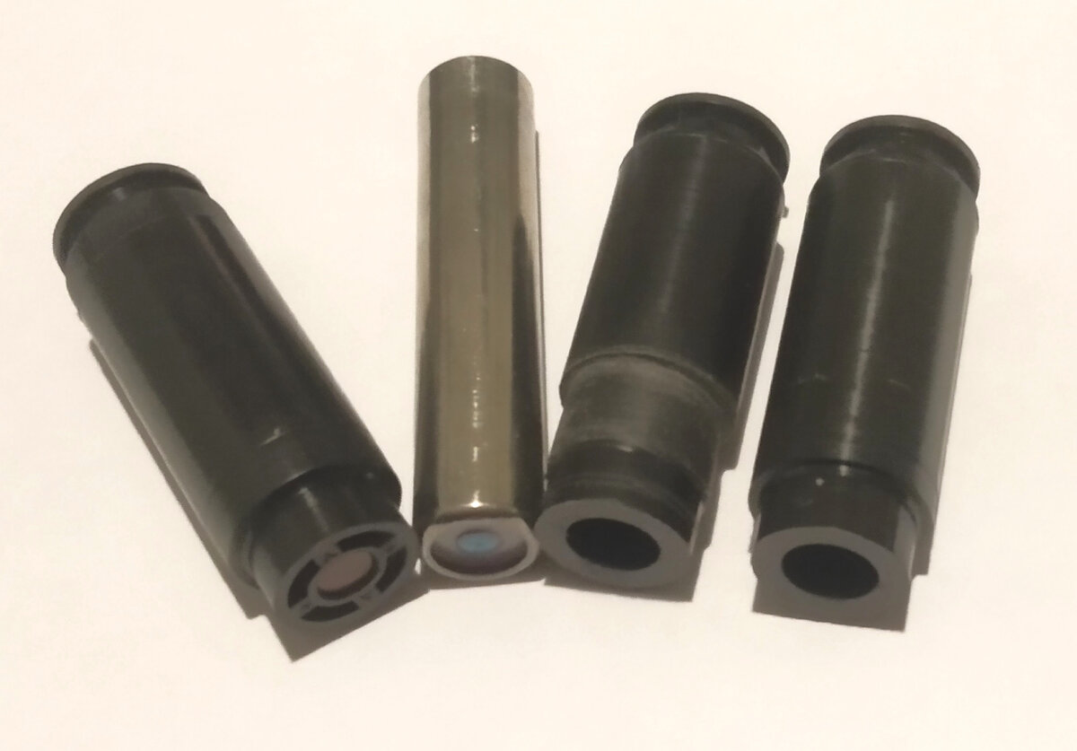 БАМы 18х51 и 13х60, переходники на 13х60 (самоделка) и на 13х50. Фото автора.