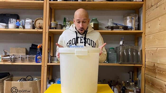 Начинающий самогонщик немного в шоке от скисшей браги. 