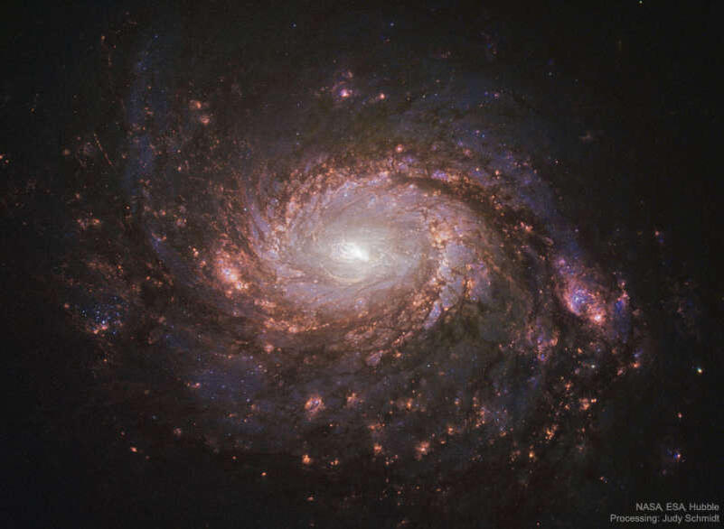 Галактика М77 (NGC 1068). 47 миллионов световых лет от Земли. Авторы и права: Космический телескоп им.Хаббла, НАСА, ЕКА; Обработка и авторские права: Джуди Шмидт