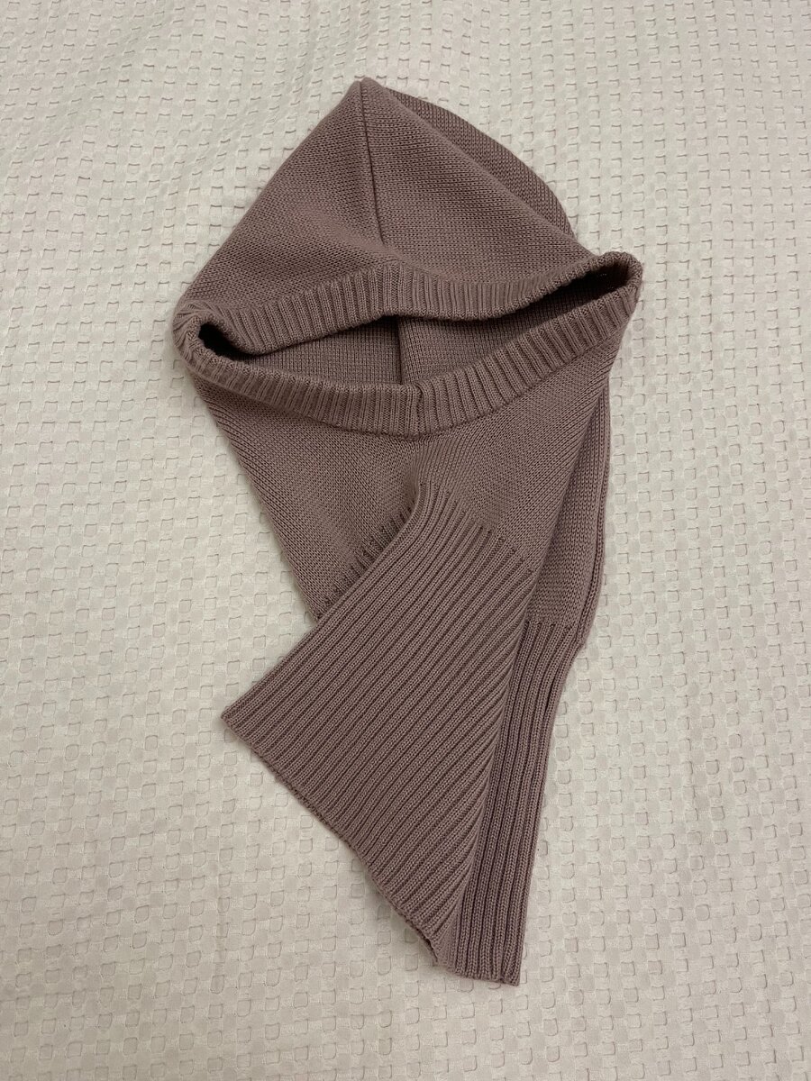 50% шерсти, теплая, но не колючая.