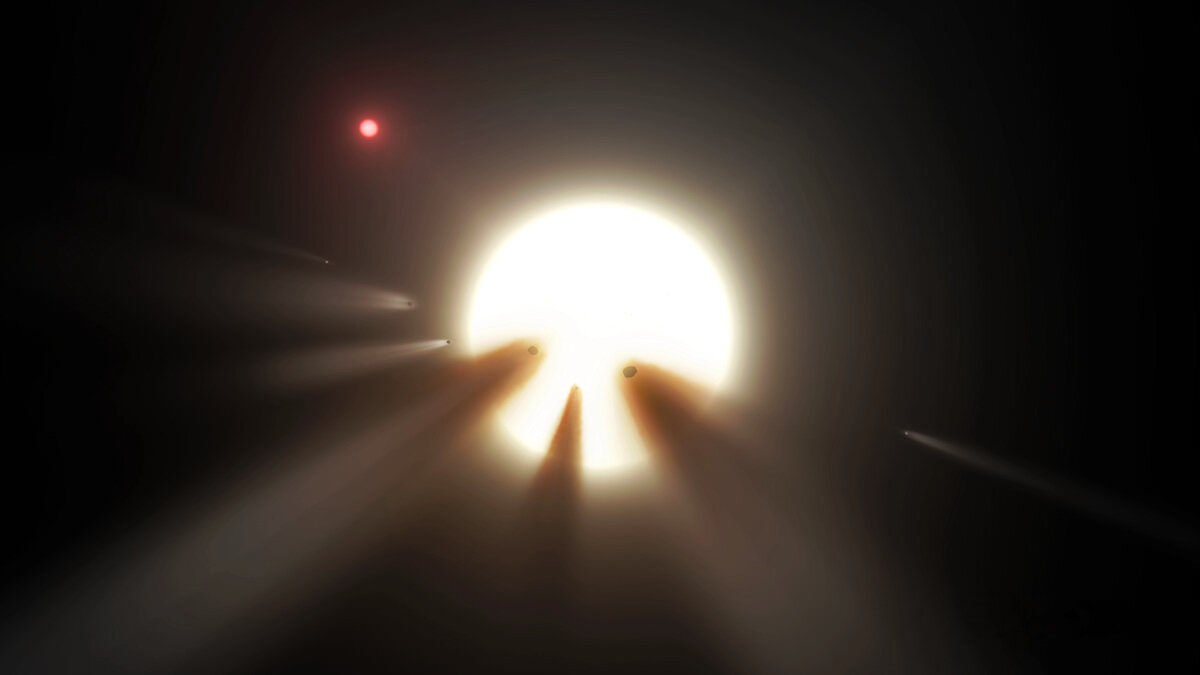 Художественное представление звезды KIC 8462852 на фоне из фрагментов разрушенной кометы. Фото: NASA/JPL-Caltech