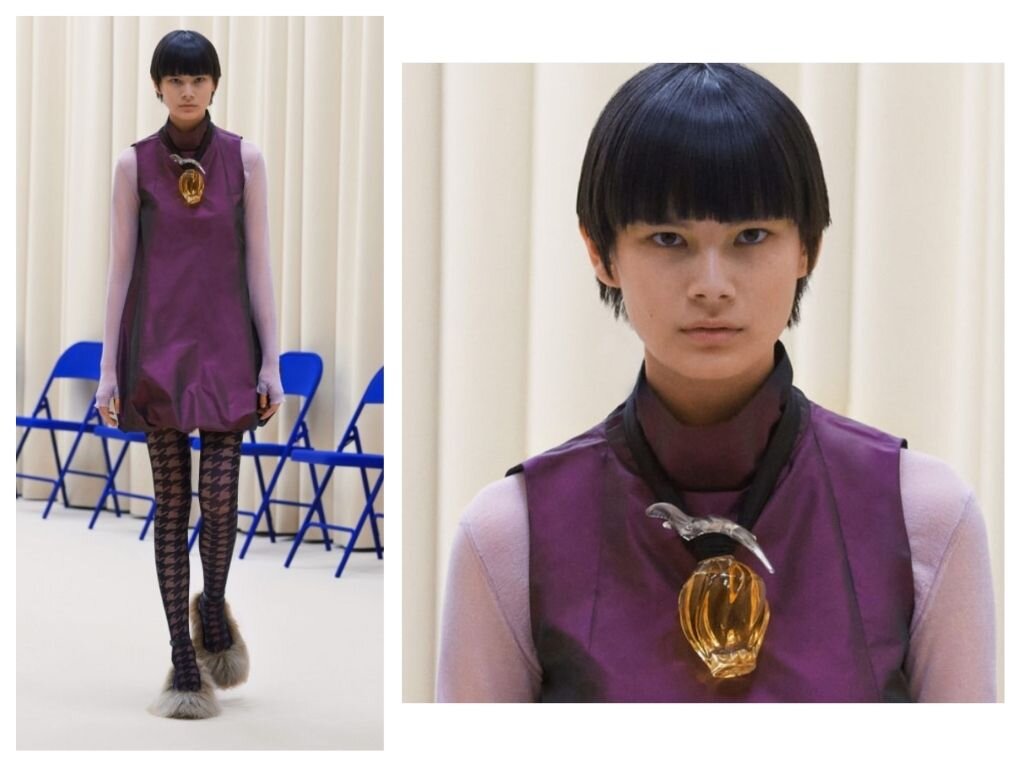 Узнаваемые флаконы L’Air du temps в качестве шейных украшений.