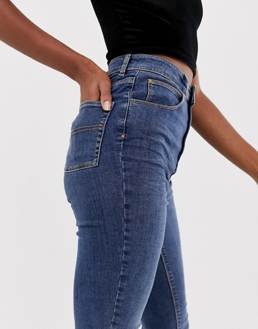 https://www.asos.com/collusion/collusion-tall-x001-skinny-jeans-in-mid-wash-blue/prd/10297619