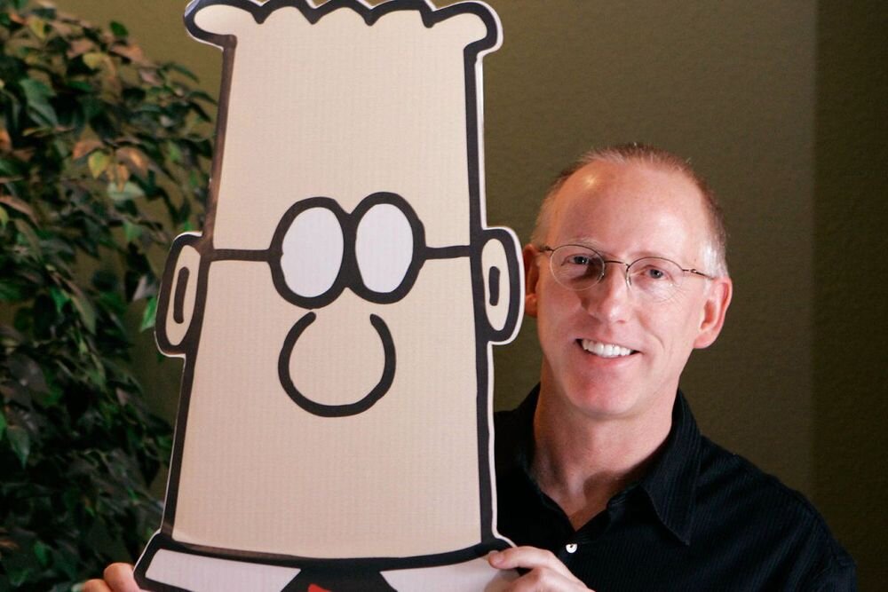 Скотт Адамс со своим персонажем Дилбертом