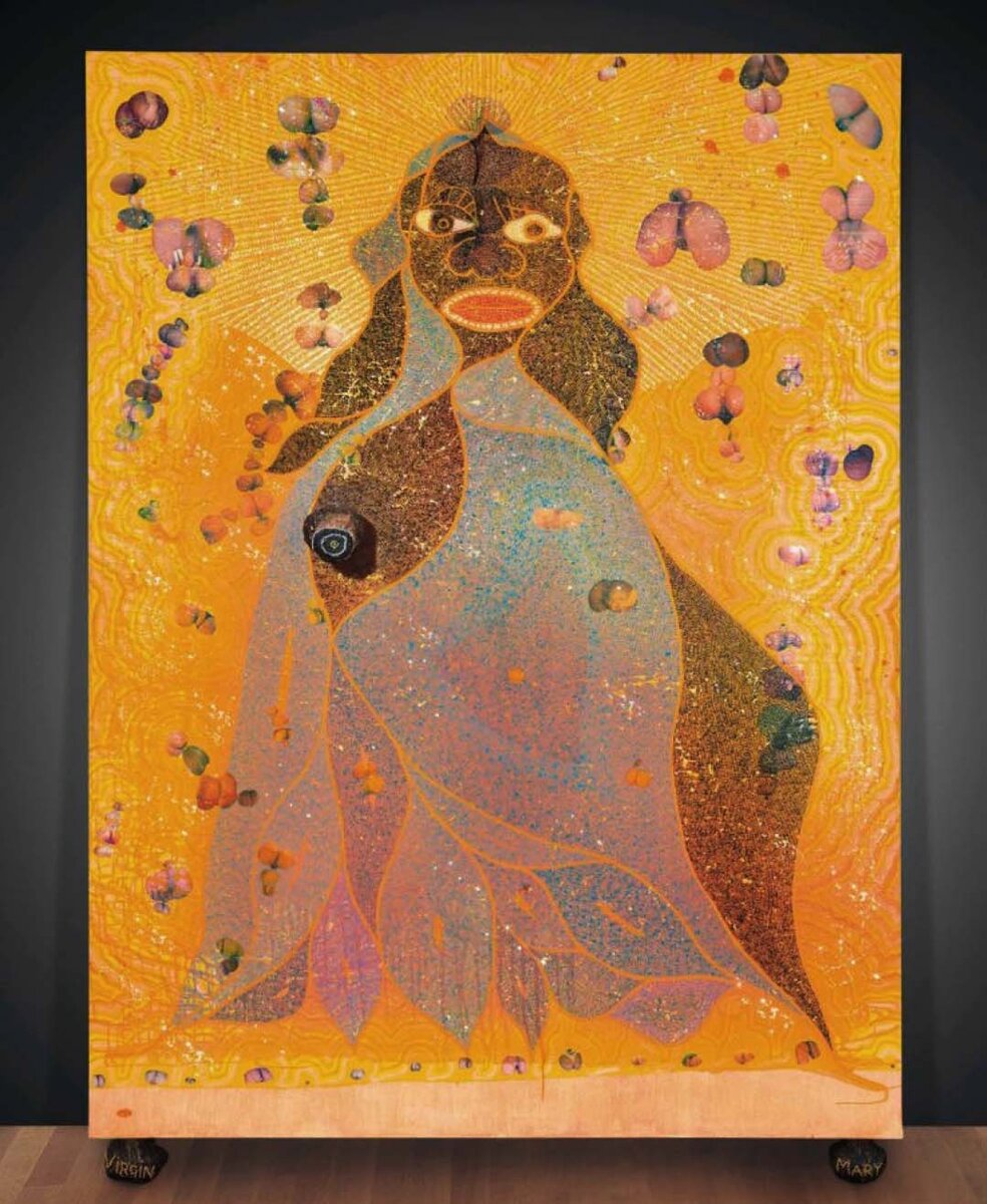 Картина Криса Офили Дева Мария. Для выполнения использовано множество материалов, самым экзотическим из которых является... слоновий помёт (комок на груди - это из него). Офили использует в работе африканские мотивы. 