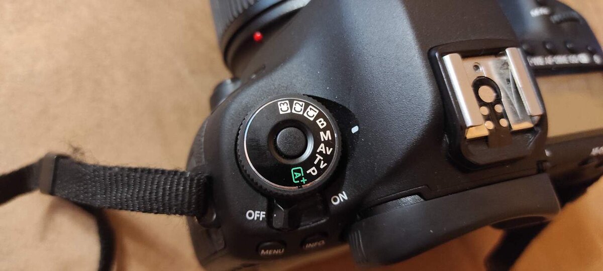 На этом колесике можно выбрать нужный режим съемки