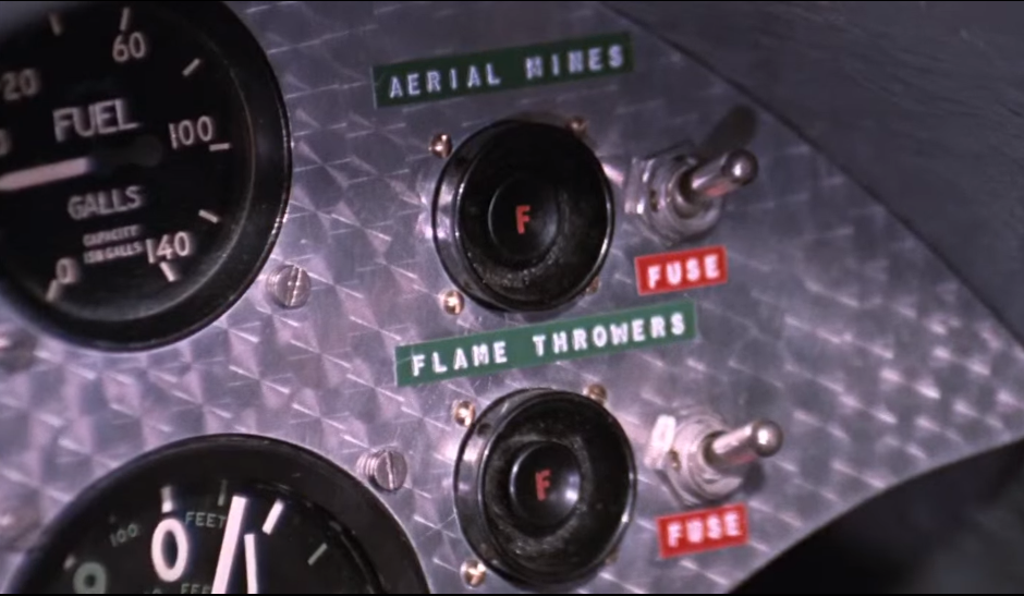 На приборном щитке автожира - кнопки "Огнемёт" и "Воздушные мины" 
(с) Кадр из фильма «Живёшь только дважды»