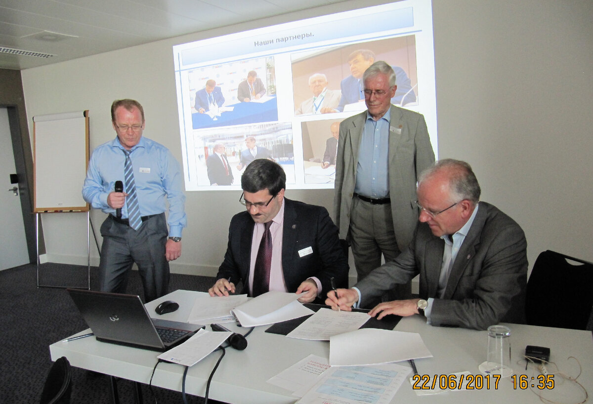 Подписание соглашения между НАИКС и BSI 22 июня 2017 года в Цюрихе.