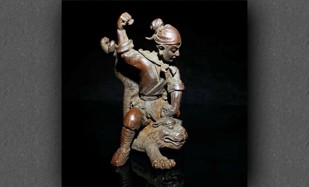 Статуэтка "У Сун забивает тигра". 