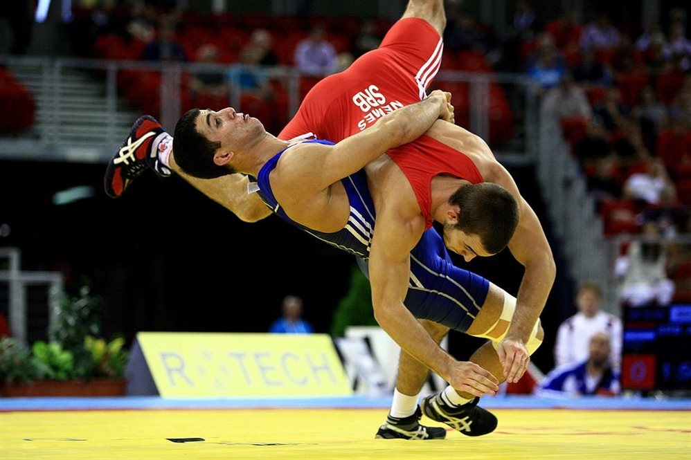 Freestyle wrestling. Спорт греко Римская борьба. Греко-Римская, Вольная борцы. Греко Римская борьба бросок. Вольная и греко Римская борьба.