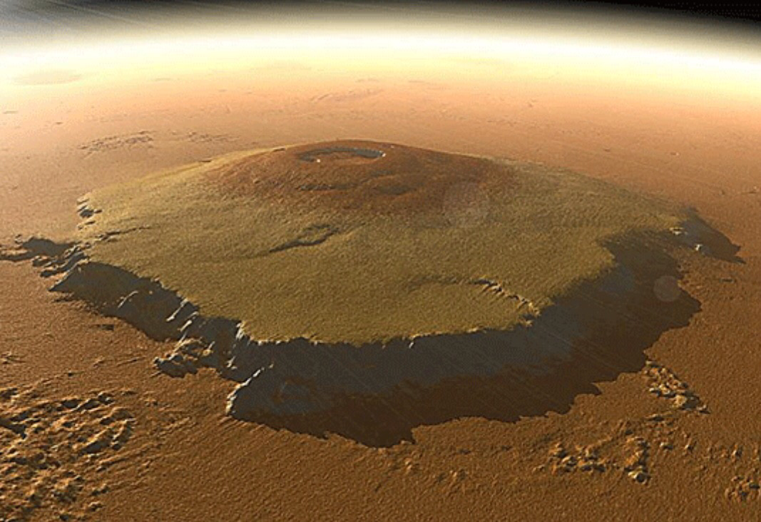 Высочайшая гора солнечной системы находится. Гора Олимп на Марсе. Вулкан Олимп на Марсе. Марс Планета гора Олимп. Олимпус Монс на Марсе.