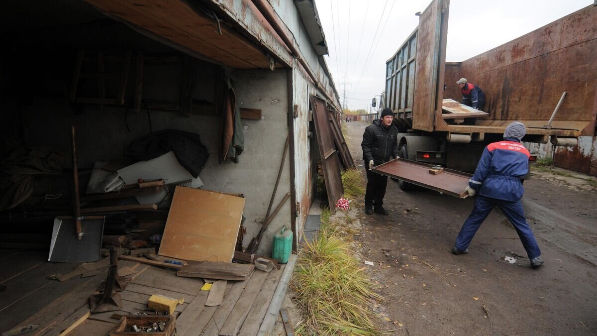    Демонтаж гаражей© РИА Новости / Константин Чалабов