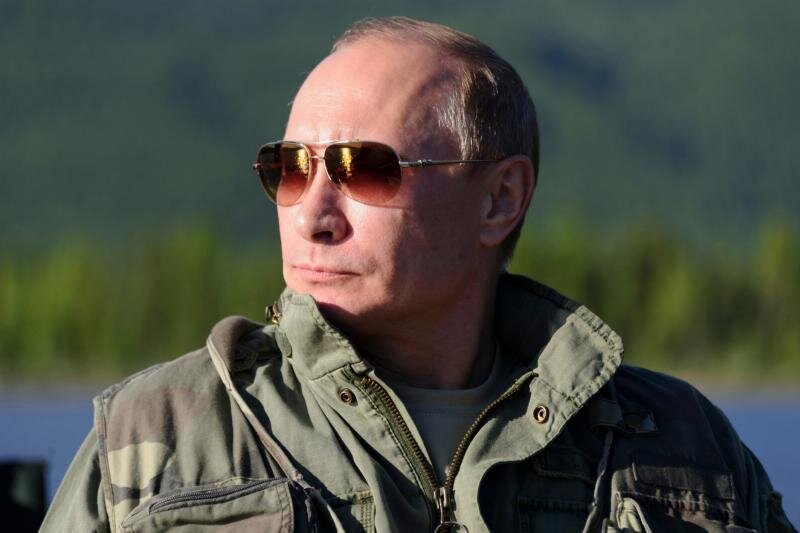 Владимир Путин на отдыхе в Сибири. 20 июля 2013 года. Фото из архива Reuters.