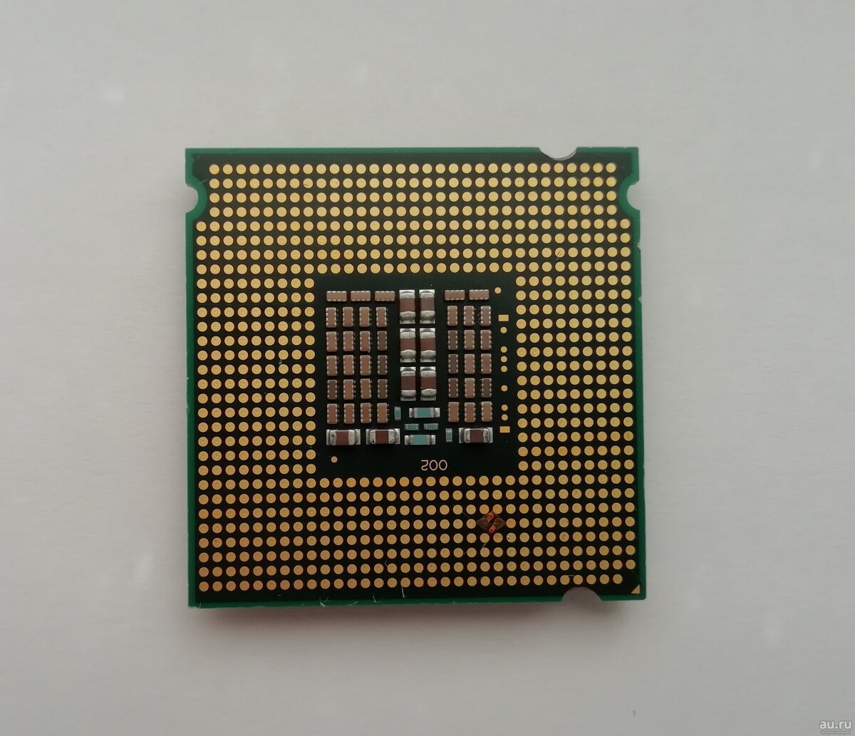 Сборка xeon e5. Зеон процессор. Ксеон е 5450 SLANQ. Xeon фото. Фото ножек процессора Xeon 2650lv3.
