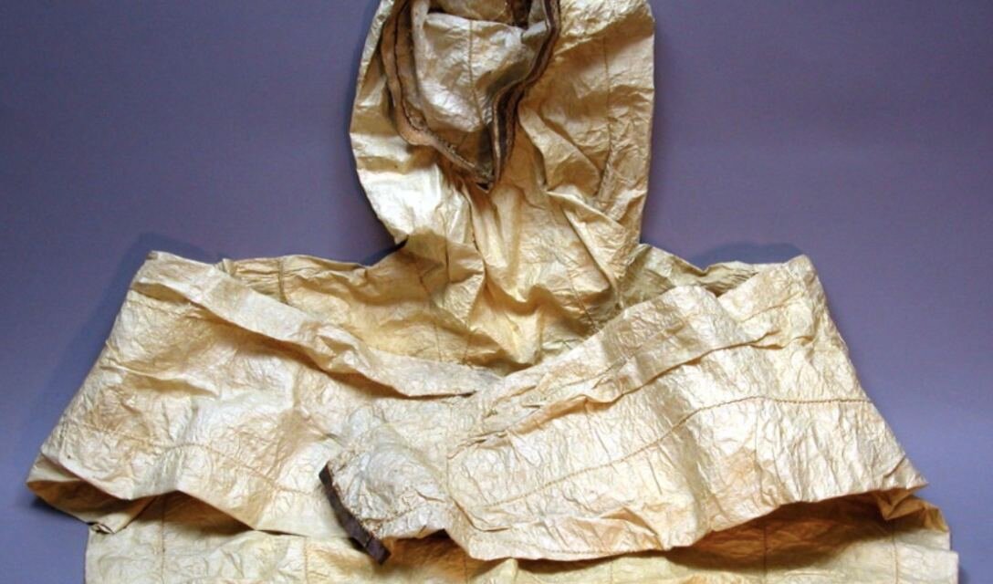 Fig. 2 - Artist unknown (West Greenland). Hooded anorak of seal intestine; sewn with reindeer or caribou sinew; banding ar, 1900-1910. Intestine; hide; 82 x 135 cm. Cambridge, MA: Peabody Museum of Archaeology and Ethnology, 970-26-10/51078. Source: JSTOR