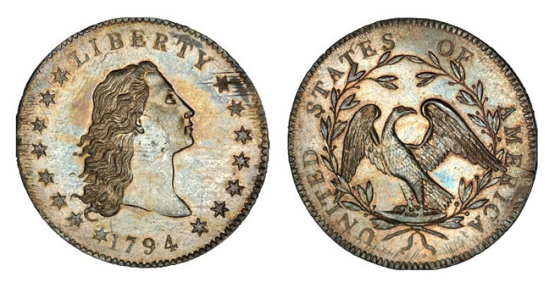 доллар "распущенные волосы" 1794 года . Серебро 900, диаметр 40 мм., вес 27 г.